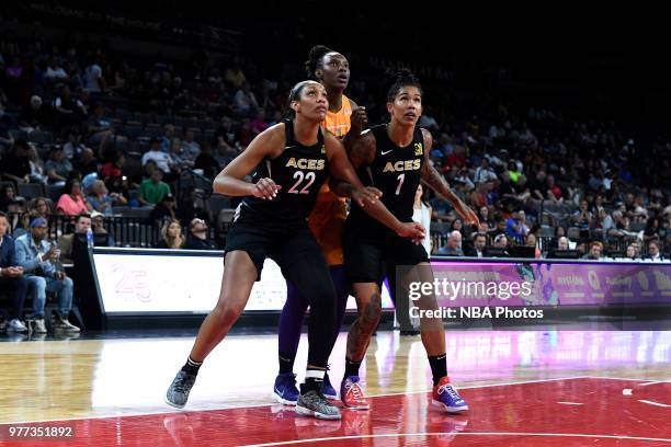 Sancho Lyttle of the Phoenix Mercury is boxed out by A'ja Wilson and Tamera Young of the Las Vegas Aces on June 17, 2018 at the Mandalay Bay Events...