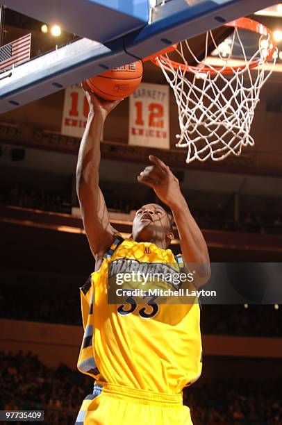 Jimmy Butler of the Marquette Golden Eagles takes a shot during the Big East Semi-Final College Basketball Tounament game against the Georgetown...