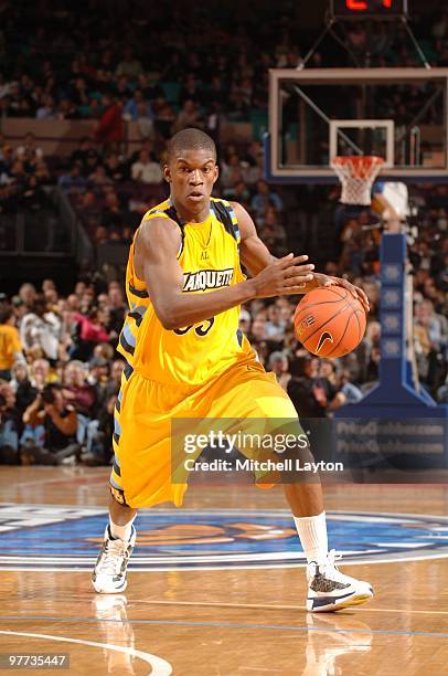 Jimmy Butler of the Marquette Golden Eagles dribbles the ball during the Big East Semi-Final College Basketball Tounament game against the Georgetown...