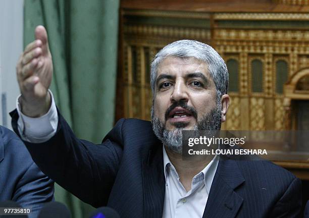 Exiled Hamas leader Khaled Meshaal speaks during a press conference with other Palestinian opposition party leaders held in Damascus on March 15,...