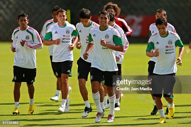 Mexico national soccer team players exercise during a training session at Mexican Soccer Federation's High Performance Center on March 15, 2010 in...