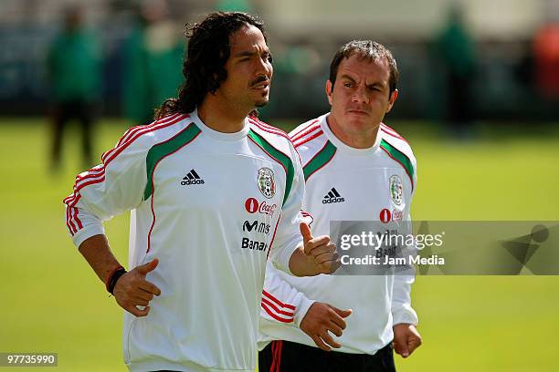 Mexico national soccer team players Braulio Luna and Cuauhtemoc Blanco exercise during a training session at Mexican Soccer Federation's High...