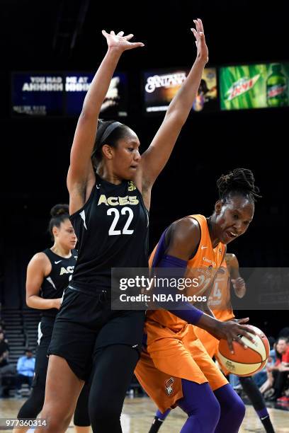 Sancho Lyttle of the Phoenix Mercury drives against A'ja Wilson of the Las Vegas Aces on June 17, 2018 at the Mandalay Bay Events Center in Las...