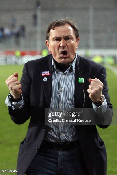 Head coach Ewald Lienen of Muenchen celebrates the 1:0 victory after the second Bundesliga match between MSV Duisburg and 1860 Muenchen at the MSV...