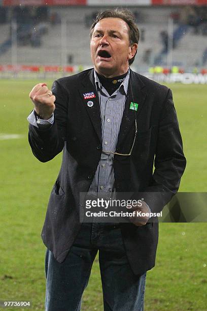 Head coach Ewald Lienen of Muenchen celebrates the 1:0 victory after the second Bundesliga match between MSV Duisburg and 1860 Muenchen at the MSV...