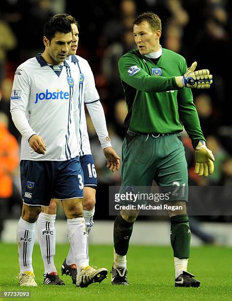 Jamie Ashdown of Portsmouth has words with team mate Ricardo Rocha during the Barclays Premier League match between Liverpool and Portsmouth at...
