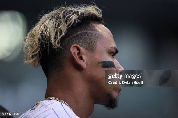 Orlando Arcia of the Milwaukee Brewers looks on in the first inning against the Philadelphia Phillies at Miller Park on June 15, 2018 in Milwaukee,...