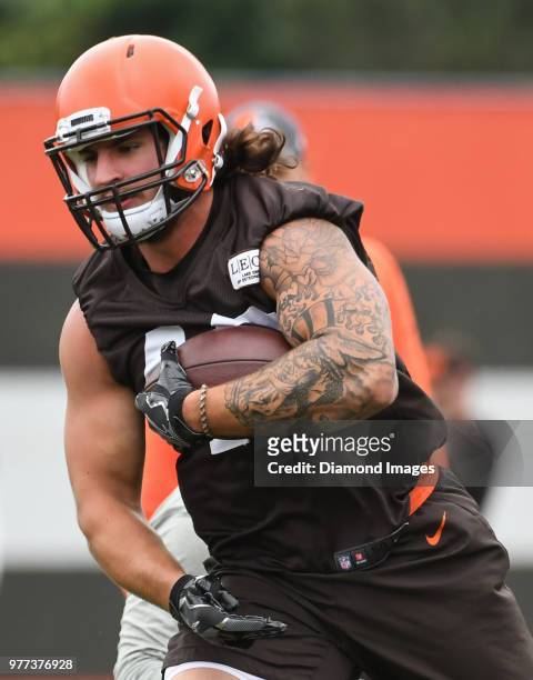 Fullback Danny Vitale of the Cleveland Browns carries the ball during a mandatory mini camp on June 12, 2018 at the Cleveland Browns training...