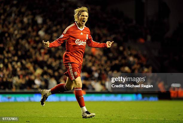 Fernando Torres of Liverpool celebrates scoring his team's fourth goal during the Barclays Premier League match between Liverpool and Portsmouth at...