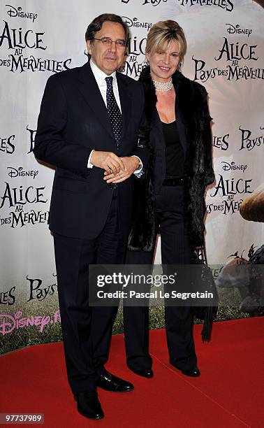 Nonce Paolini and wife Catherine attend the premiere of Tim Burton's film "Alice au pays des merveilles" at Theatre Mogador on March 15, 2010 in...