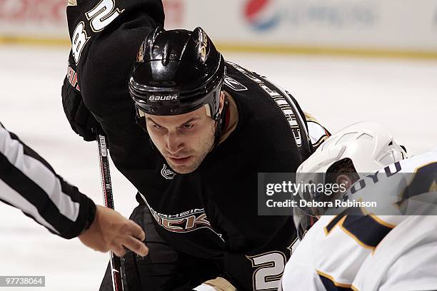 Kyle Chipchura of the Anaheim Ducks faces off against Dustin Boyd of the Nashville Predators during the game on March 12, 2010 at Honda Center in...