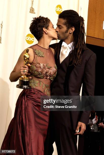 Halle Berry, winner of the Actress in a Leading Role award, and her husband Eric Benet