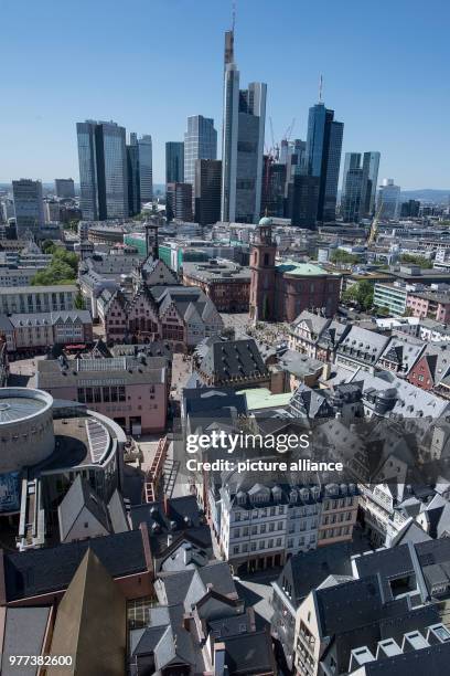 May 2018, Germany, Frankfurt am Main: The new Frankfurt old town is located at the heart of Frankfurt in front of the bank skyline. The last works of...