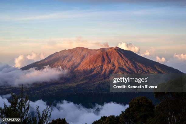 volcano at sunset, cortago, costa rica - costa rica volcano stock pictures, royalty-free photos & images