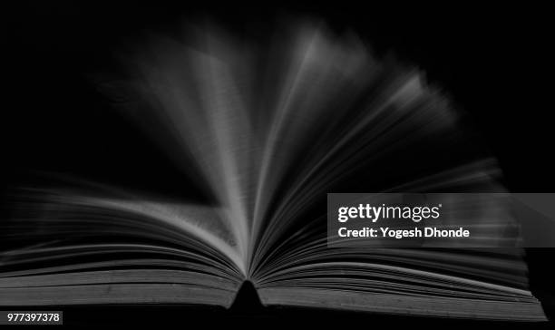 turn the pages - literature abstract stock pictures, royalty-free photos & images
