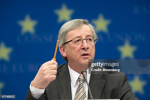 Jean-Claude Juncker, Luxembourg's prime minister and president of the Eurogroup, speaks at a news conference following the meeting of European Union...