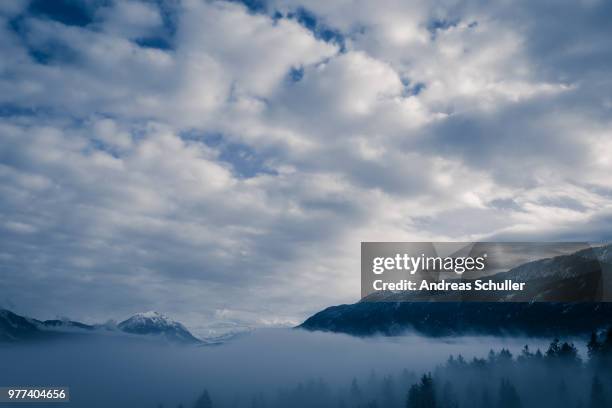 between fog and clouds - schnuller stock pictures, royalty-free photos & images