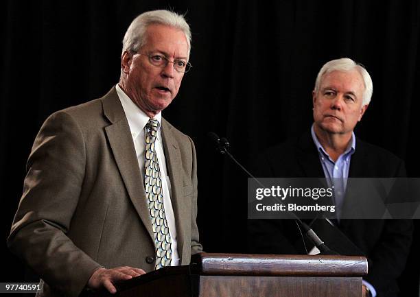 Bob Waltz vice president of product, quality and service support for Toyota Motor Sales, USA, Inc., left, speaks as Mike Michels, vice president of...