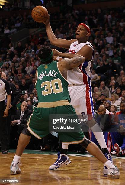 Charlie Villanueva of the Detroit Pistons passes the ball as Rasheed Wallace of the Boston Celtics defends on March 15, 2010 at the TD Garden in...