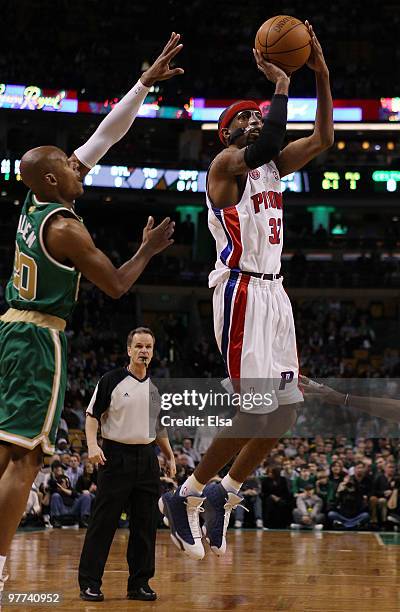 Richard Hamilton of the Detroit Pistons takes a shot as Ray Allen of the Boston Celtics defends on March 15, 2010 at the TD Garden in Boston,...