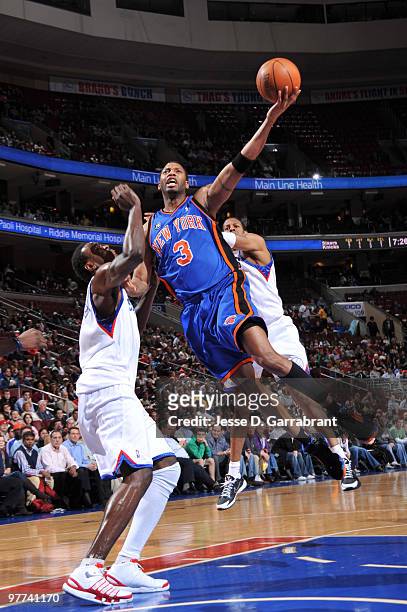 Tracy McGrady of the New York Knicks shoots against Samuel Dalembert of the Philadelphia 76ers during the game on March 15, 2010 at the Wachovia...