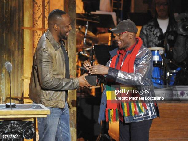 Musician Wyclef Jean and Inductee Jimmy Cliff speak onstage at the 25th Annual Rock And Roll Hall of Fame Induction Ceremony at the Waldorf=Astoria...