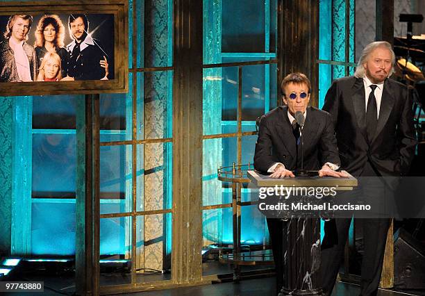 Musicians Barry Gibb and Robin Gibb speak onstage at the 25th Annual Rock And Roll Hall of Fame Induction Ceremony at the Waldorf=Astoria on March...