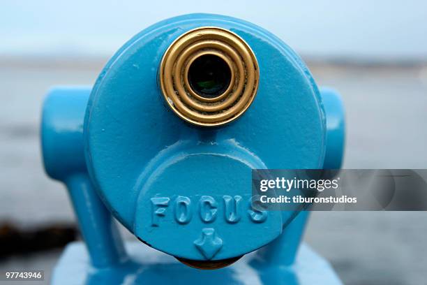 blue telescope viewer with word "focus" - looking through lens stock pictures, royalty-free photos & images