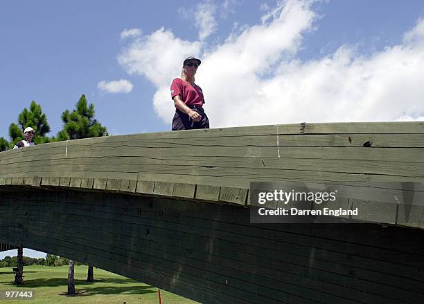 Kristal Parker of the USA crosses a bridge on the 8th fairway during the first round at the ANZ Australian Ladies Masters Golf at Royal Pines Resort...