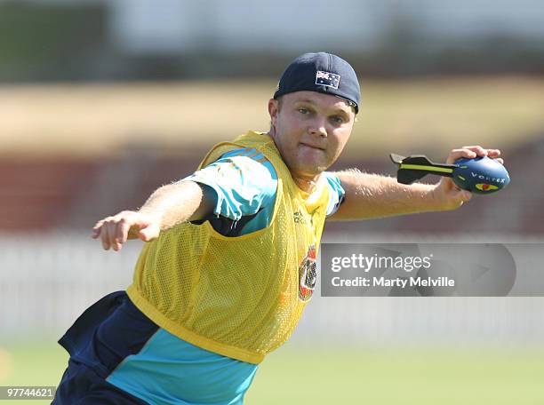 Doug Bollinger of Australia cmakes a pass during an Australian Training Session at Basin Reserve on March 16, 2010 in Wellington, New Zealand.