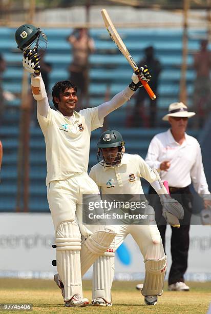 Bangladesh batsman Junaid Siddique celebrates his century with Mushfiqur Rahim during day five of the 1st Test match between Bangladesh and England...