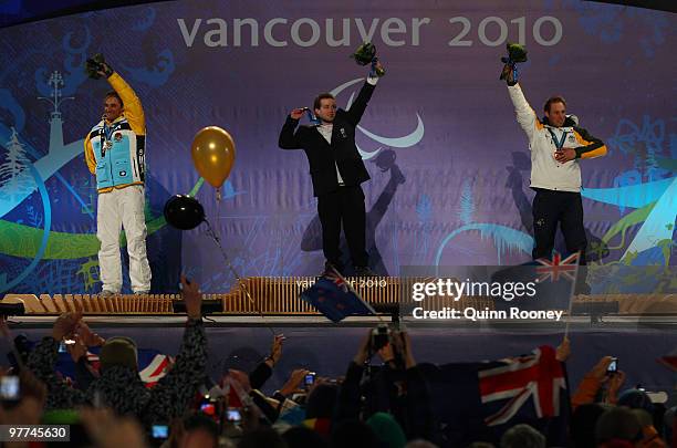 Silver medalist Gerd Schonfelder of Germany, gold medalist Adam Hall of New Zealand and bronze medalist Cameron Rahles-Rahbula of Australia during...