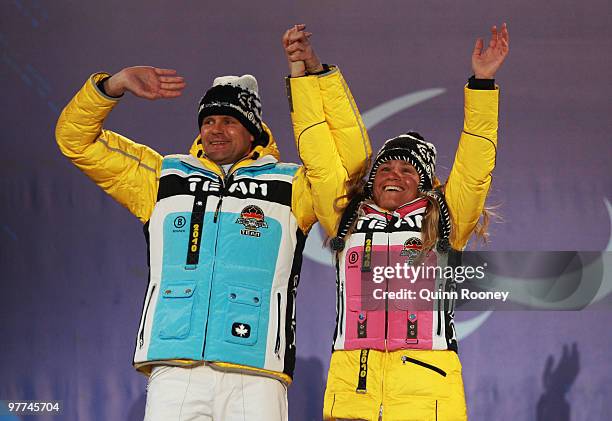 Gold medalist Verena Bentele of Germany and guide Thomas Friedrich celebrate during the medal ceremony for the Women's 15km Free Visually Impaired...