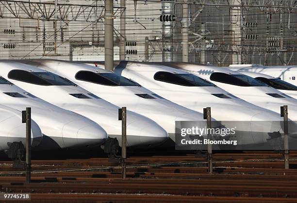 Central Japan Railway Co.'s 700 series Shinkansen bullet trains are parked at a train yard in Tokyo, Japan, on Wednesday, March 10, 2010. Central...