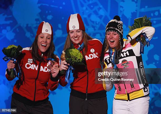 Silver medalist Andrea Rothfuss of Germany, gold medlaist Lauren Woolstencroft of Canada and bronze medalist Karolina Wisniewska of Canada pose...