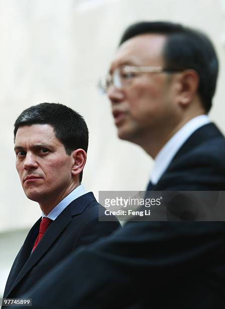 Chinese Foreign Minister Yang Jiechi answers questions from the media as UK Foreign Secretary David Miliband looks on after a meeting at Chinese...