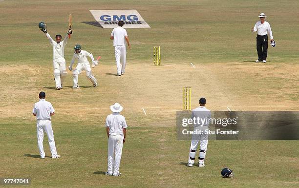 Bangladesh batsman Junaid Siddique celebrates his century with Mushfiqur Rahim during day five of the 1st Test match between Bangladesh and England...