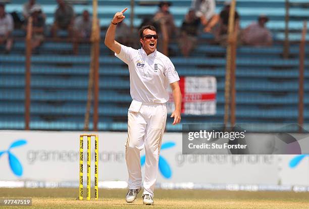 England bowler Graeme Swann celebrates after taking the wicket of Bangladesh batsman Junaid Siddique for 106 runs during day five of the 1st Test...