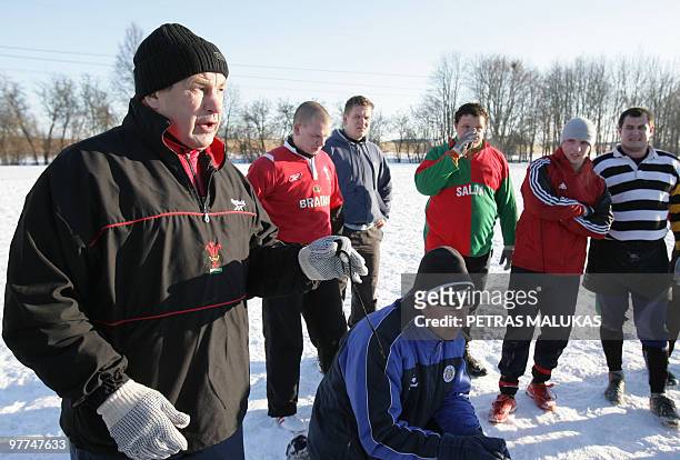 Lithuanian rugby team manager Anatolius Smirnovas instructs players during training in Siauliai on March 6, 2010. Rising from the depths of Europe's...