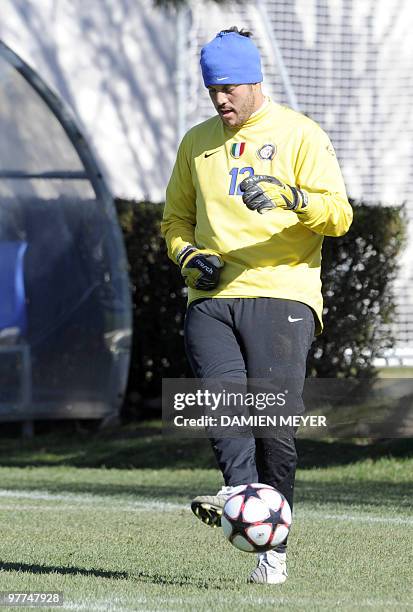 Inter Milan's Brazilian goalkeeper Julio Cesar plays the ball during a training session on the eve of their UEFA Champions League football match...