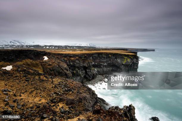 amazing icelandic landscape at londrangar cliffs. northern cost of iceland. - hellnar stock pictures, royalty-free photos & images