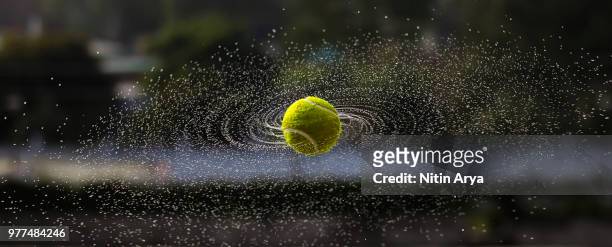 spinning tennis ball, gwalior, madhya pradesh, india - tennis ball imagens e fotografias de stock