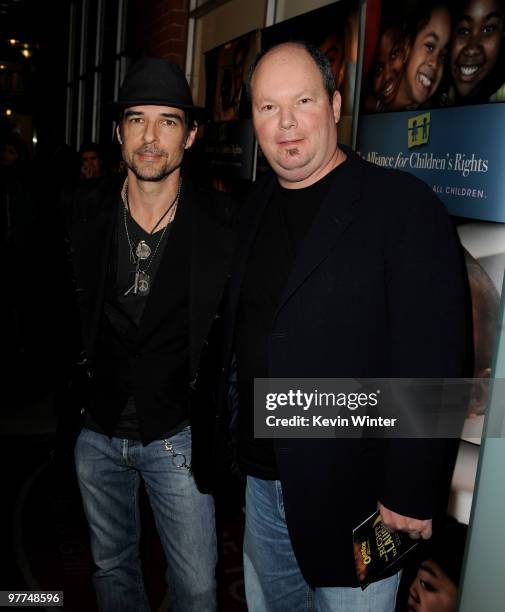 Musician Jonathan Clark and singer Christopher Cross arrive at the Alliance for Children's Rights "Right to Laugh" fundraiser at the Catalina Club on...