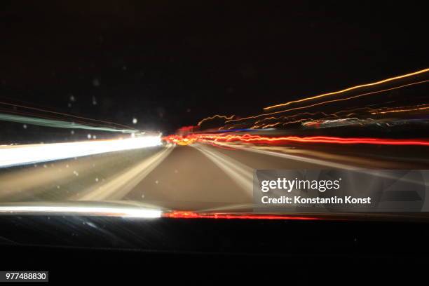 lights in the night - konst stock pictures, royalty-free photos & images