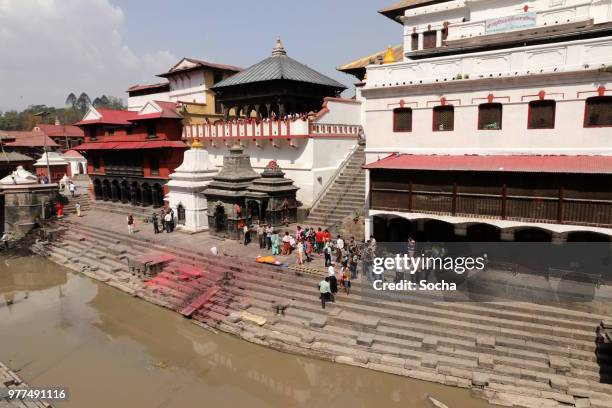 pashupatinath temple and the burning ghats in kathmandu, nepal - morgue feet stock pictures, royalty-free photos & images