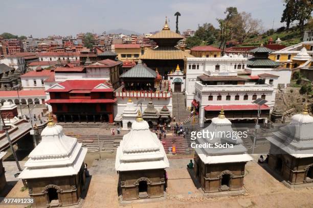 pashupatinath temple and the burning ghats in kathmandu, nepal - foot worship stock pictures, royalty-free photos & images
