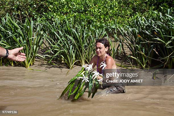 Colombian scientist Ariadna Libertad Burgos of the National Museum of Natural History takes samples to study the biodiversity of the mangrove on...