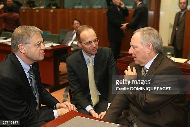 German Federal Interior Minister Wolfgang Schaeuble speaks with Netherlands Justice Minister Ernst Hirsch Ballin and Luxembourg Justice Minister Luc...