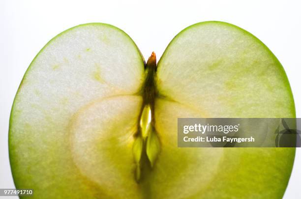 apple slice - green apple slice stock pictures, royalty-free photos & images