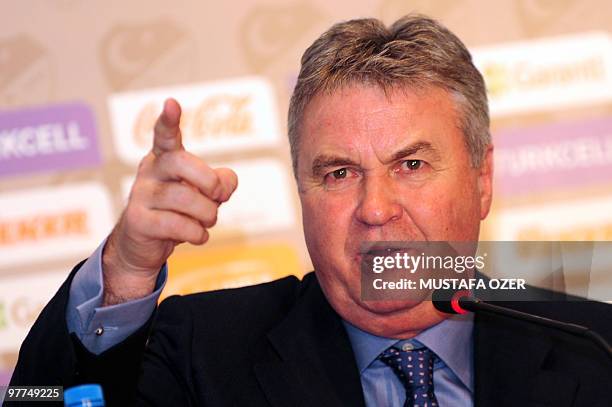 New Turkish national football team new coach Guus Hiddink gives a press conference with President of Turkish Football Federation Mahmut Ozgener after...